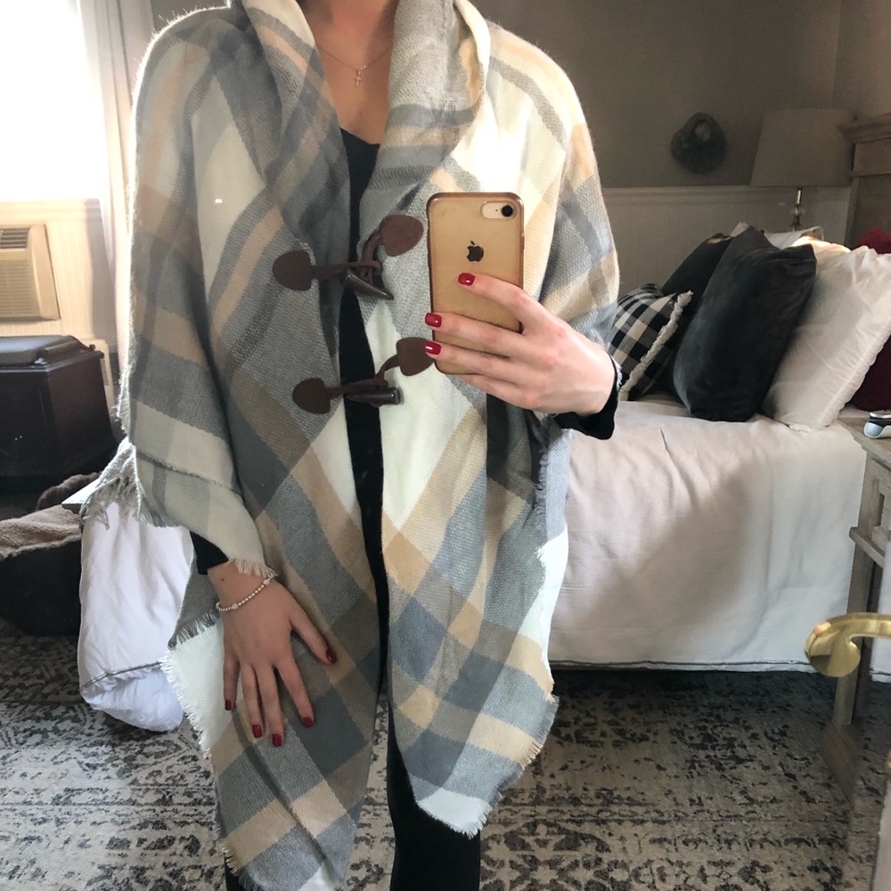 Francesca’s poncho sweater
